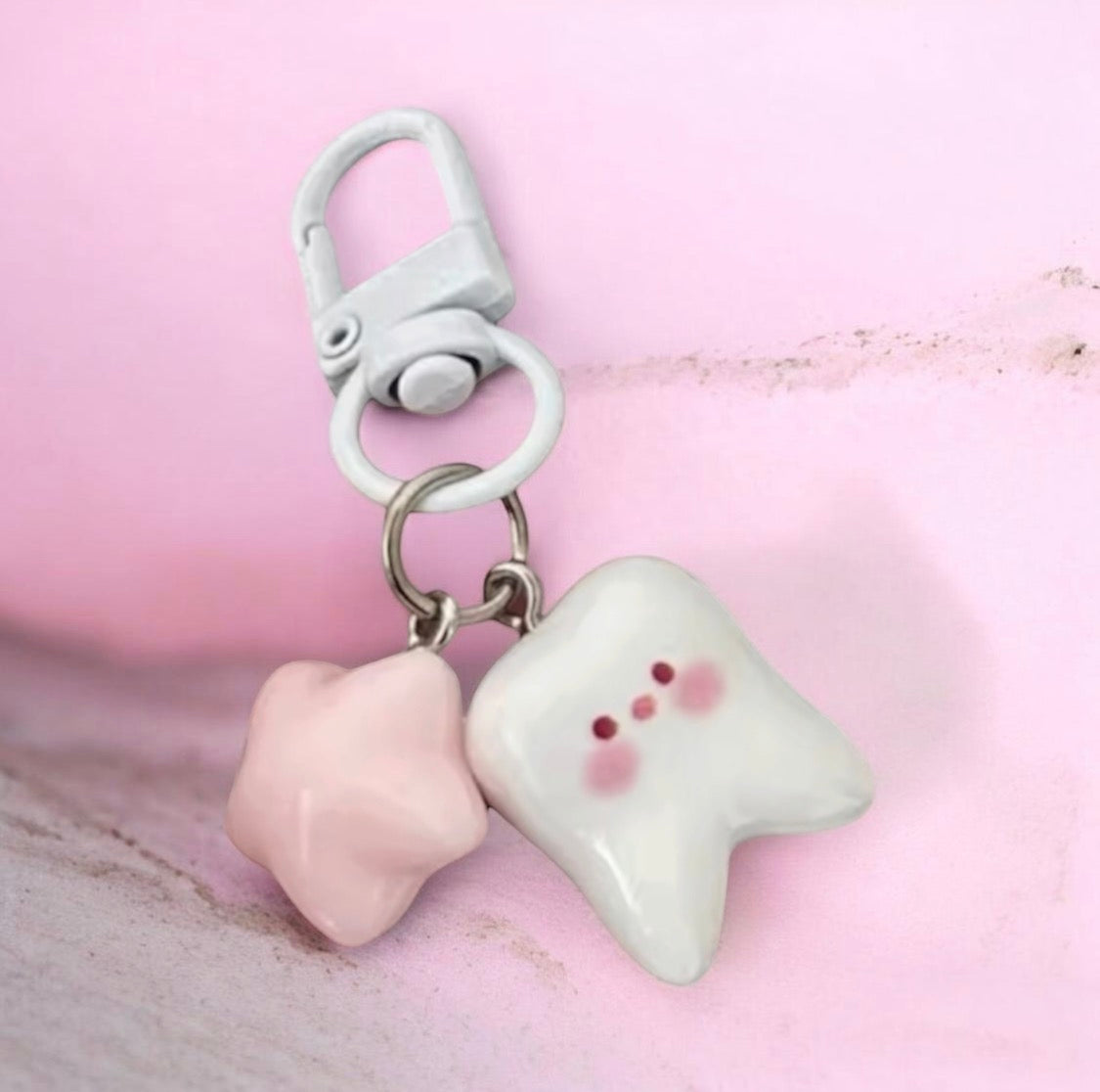 BLUSH TOOTH KEYCHAIN