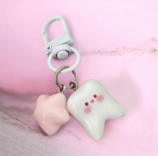 BLUSH TOOTH KEYCHAIN