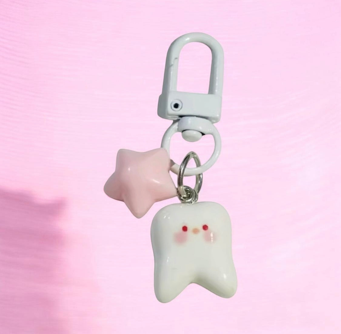 BLUSH TOOTH KEYCHAIN