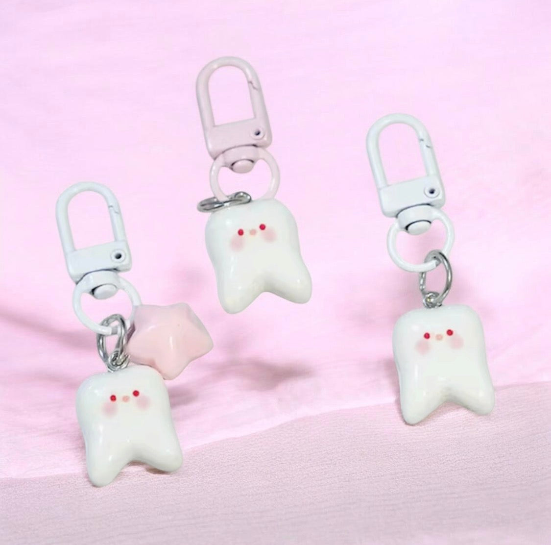 BLUSH TOOTH KEYCHAIN