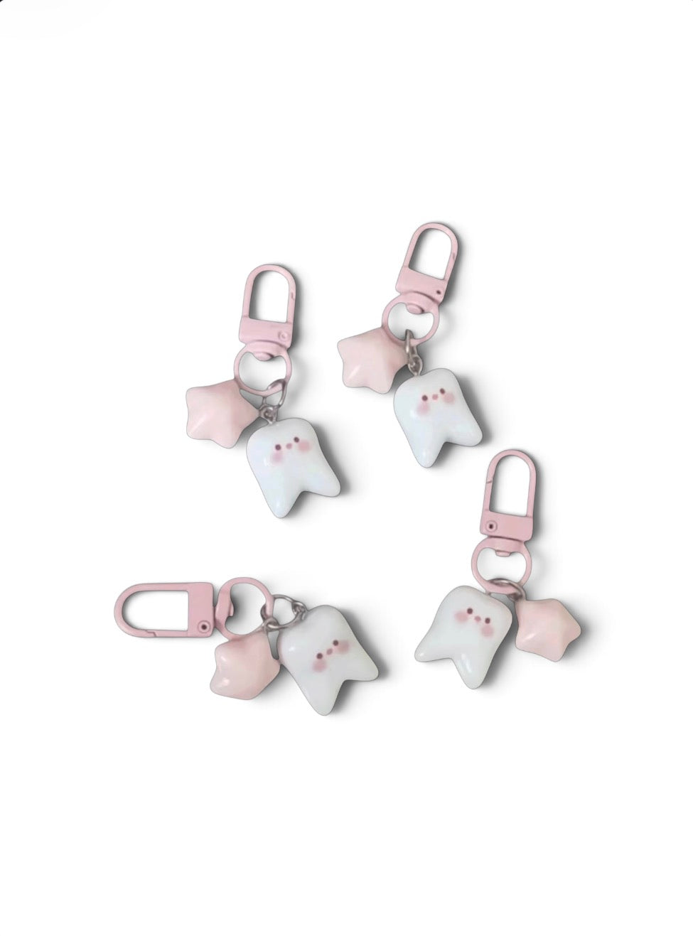 BLUSH TOOTH KEYCHAIN