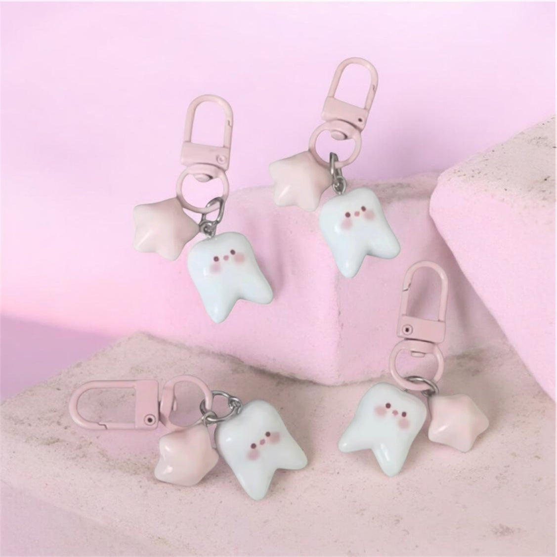 BLUSH TOOTH KEYCHAIN