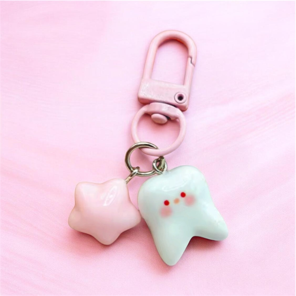 BLUSH TOOTH KEYCHAIN