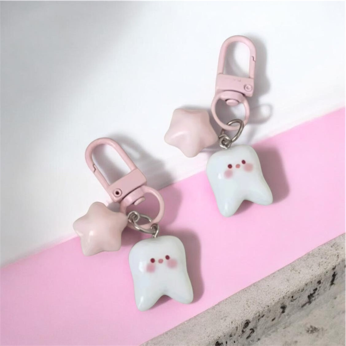 BLUSH TOOTH KEYCHAIN